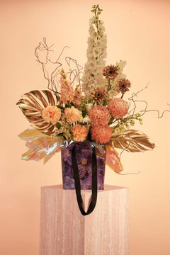 Opulent Peach Bag Arrangement