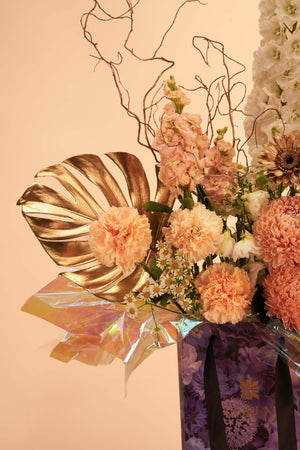 Opulent Peach Bag Arrangement